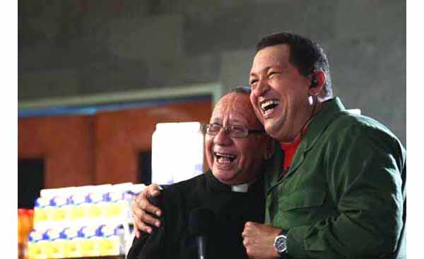 Hugo Chavez Blessed by a Priest 02